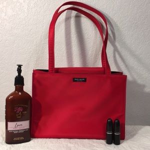 Satin red Kate Spade purse. Dust bag included.